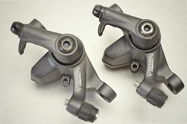 TEKTRO NOVELA BICYCLE MECHANICAL GRAY FRONT AND REAR DISC BRAKE CALIPERS